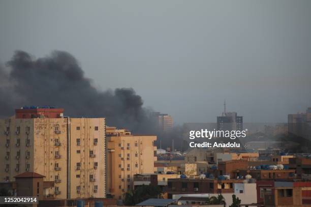 Smoke rises during clashes between the Sudanese Armed Forces and the paramilitary Rapid Support Forces on the first day of Eid Al-Fitr in Khartoum,...