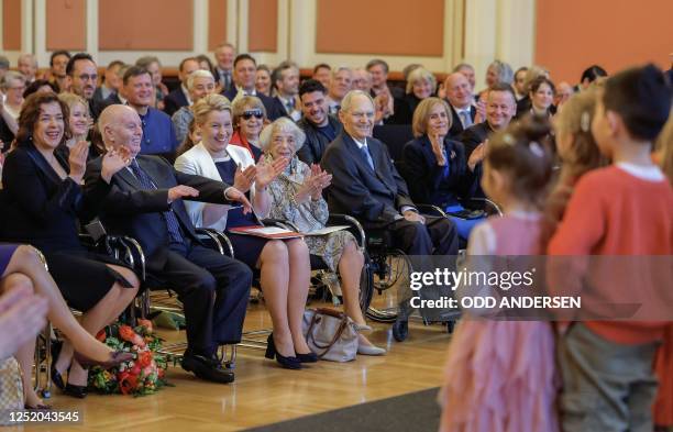 Argentine-born pianist and conductor Daniel Barenboim and his wife Russian-born pianist Elena Bashkirova and Berlin's governing Mayor Franziska...