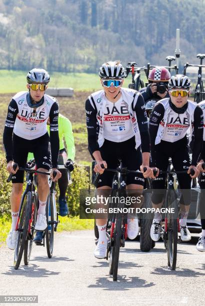 Slovenia's Tadej Pogacar and teammates of UAE Team Emirates ride during a training and track reconnaissance session, ahead of the...