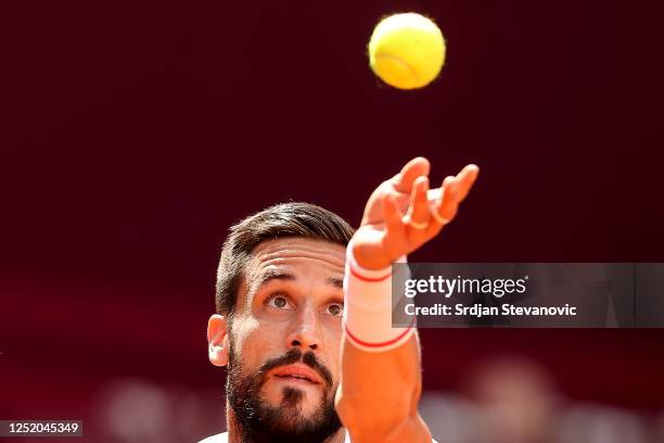 Damir Dzumhur of Bosnia and Herzegovina serves the ball to Andrey Rublev during the ATP 250 Srpska Open 2023 Quarterfinal match at National Tennis...