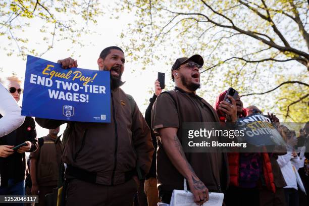 Workers and Teamsters members during a rally outside a UPS hub in the Brooklyn borough of New York, US, on Friday, April 21, 2023. Part-timers and...
