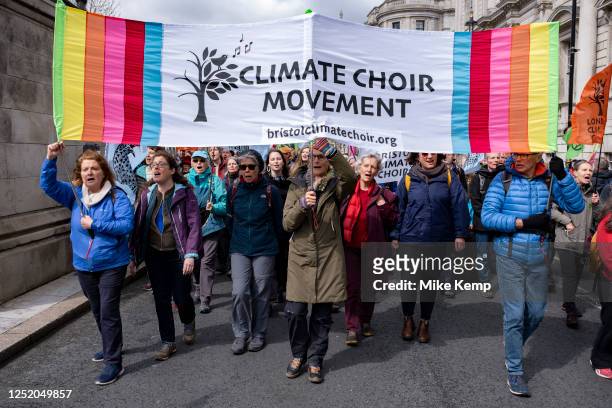 Thousands of protesters from various environmental groups including the Bristol Climate Choir, part of the Climate Choir Movement join together with...
