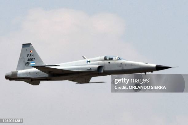 An F5 supersonic aircraft flies over the capital on the 92nd anniversary of the Honduran Air Force at the "Hernan Acosta Mejia" air base in...