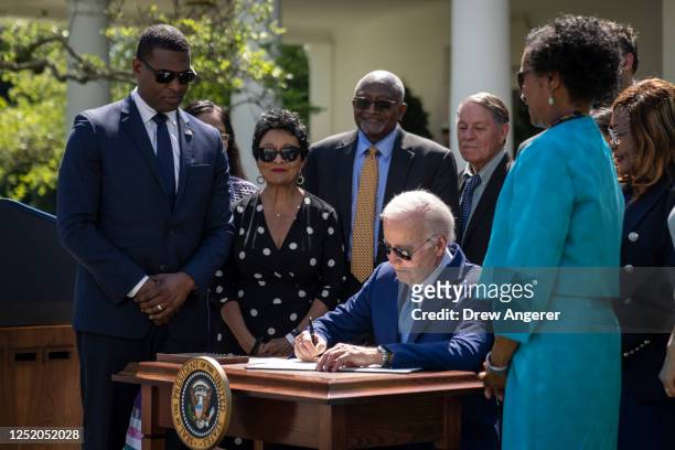 President Joe Biden signs an executive order that would create the White House Office of Environmental Justice, in the Rose Garden of the White House...