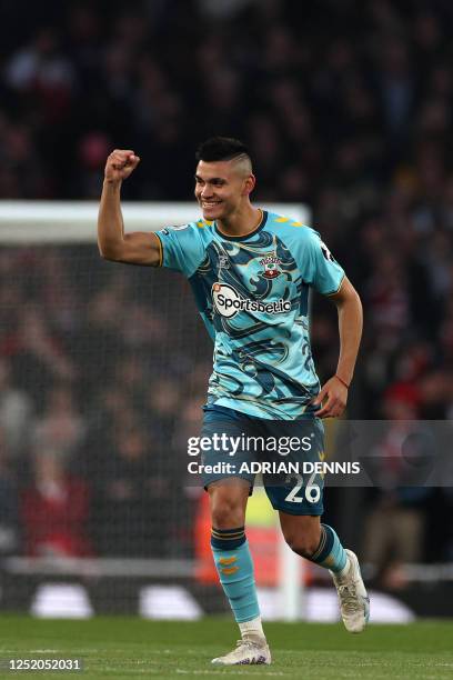 Southampton's Argentinian midfielder Carlos Alcaraz celebrates after scoring the early opening goal during the English Premier League football match...