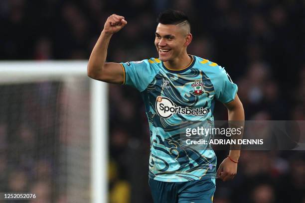 Southampton's Argentinian midfielder Carlos Alcaraz celebrates after scoring the early opening goal during the English Premier League football match...