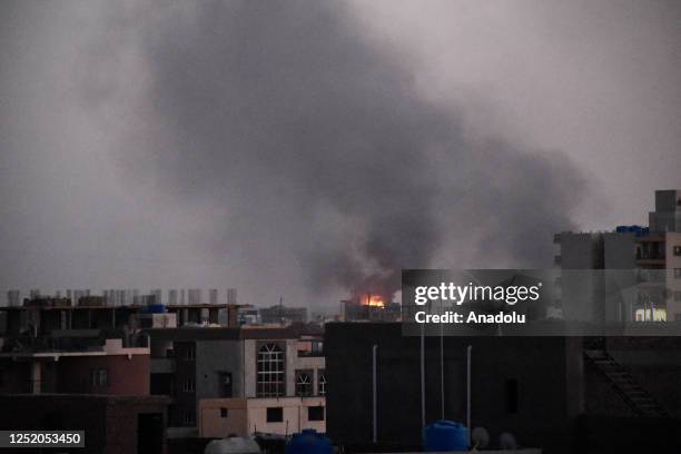 Smoke rises after an intense shelling and gunfights between soldiers and gunmen from the paramilitary Rapid Support Forces in Sudan on April 21, 2023...