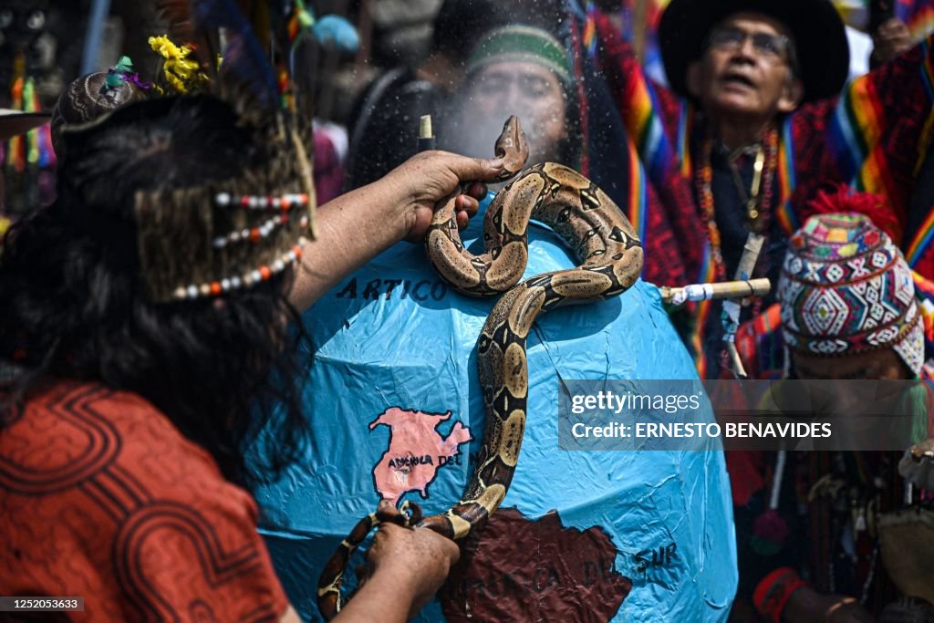 Peru Ritual A Peruvian shaman holds a live snake during a ritual to deliver... News ...