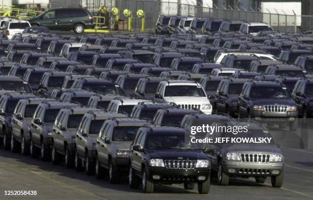 DaimlerChrysler Chrysler Group's Jeep Grand Cherokees sit ouside their Jefferson Avenue Assembly Plant 26 February 2001 in Detroit. DaimlerChrysler...