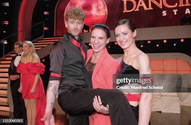 Lucas Fendrich, Conny Kreuter and Lenka Pohoralek pose during the "Dancing Stars" TV show at ORF Zentrum on April 21, 2023 in Vienna, Austria.