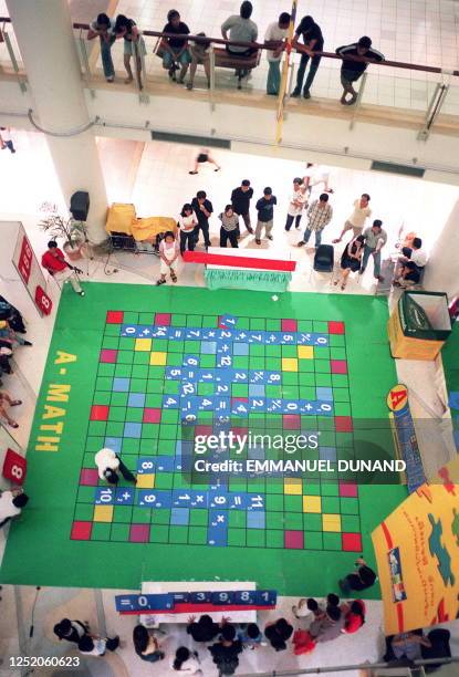Asian Math Scrabble 15 Giant Scrabble Stock Photos, High-Res Pictures, and Images - Getty ...