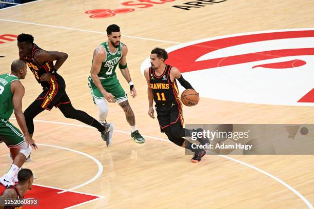 Trae Young of the Atlanta Hawks drives to the basket against the Boston Celtics during round one game three of the 2023 NBA Playoffs on April 21,...