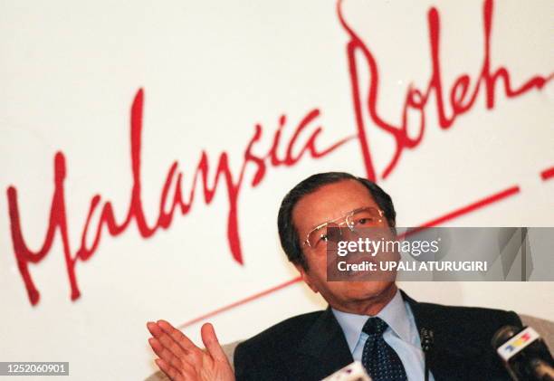 Malaysian Prime Minister Mahathir Mohamad talks to the press after announcing the new foreign exchange controls by the central bank 01 September. The...