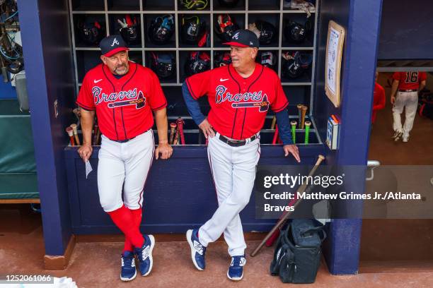 Walt Weiss and Brian Snitker of the Atlanta Braves before the gameagainst the Houston Astros at Truist Park on April 21, 2023 in Atlanta, Georgia.