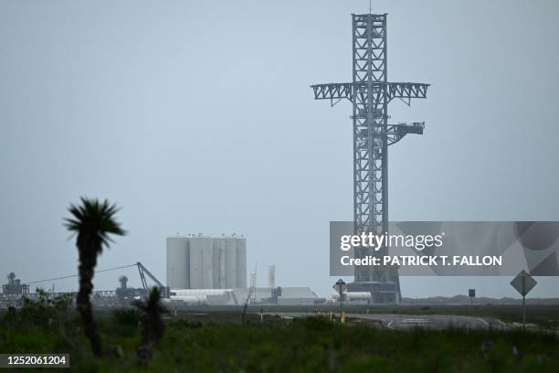 The SpaceX Starship catch and launch tower stands following the rocket launch from the SpaceX Starbase in Boca Chica, Texas on April 21, 2023. -...