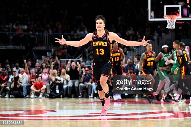 Bogdan Bogdanovic of the Atlanta Hawks celebrates during the game against the Boston Celtics during round one game three of the 2023 NBA Playoffs on...