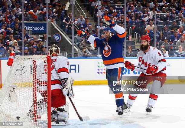 Kyle Palmieri of the New York Islanders scores a goal past Antti Raanta of the Carolina Hurricanes during the third period in Game Three of the First...