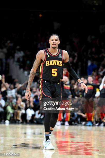 Dejounte Murray of the Atlanta Hawks looks on during the game against the Boston Celtics during round one game three of the 2023 NBA Playoffs on...