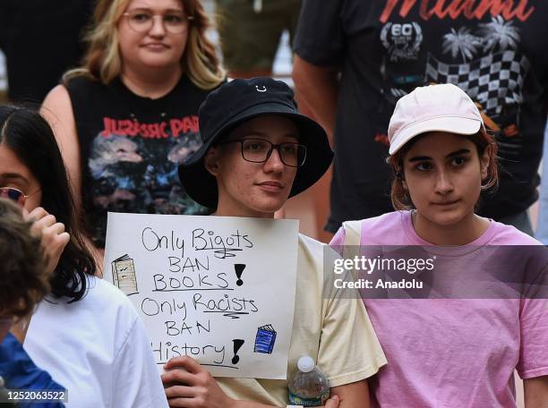 Person holds a placard at a âWalkout 2 Learnâ rally to protest Florida education policies outside Orlando City Hall on April 21, 2023 in Orlando,...