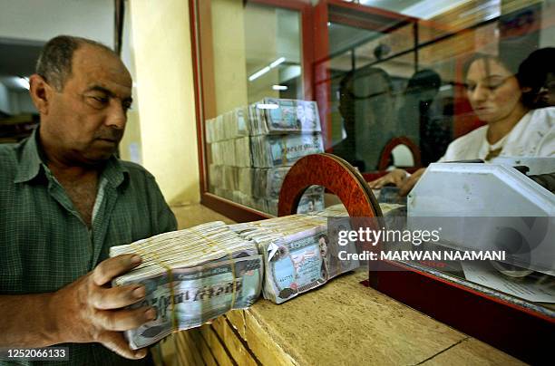 Iraq Money Stack 84 Saddam Hussein Banknotes Stock Photos, High-Res Pictures, and Images ...