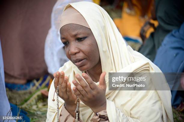 Woman prays as Muslim faithful hold Eid al-Fitr prayer to mark the end of holy month of Ramadan at Ikeja, Lagos, Nigeria, on Friday, 22nd April, 2023.