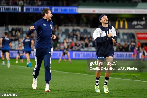 Isaac Smith and Brad Close of the Cats warm up during the 2023 AFL Round 06 match between the Geelong Cats and the Sydney Swans at GMHBA Stadium on...