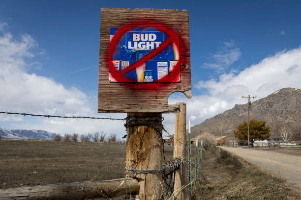 Sign disparaging Bud Light beer is seen along a country road on April 21, 2023 in Arco, Idaho. Anheuser-Busch, the brewer of Bud Light has faced...