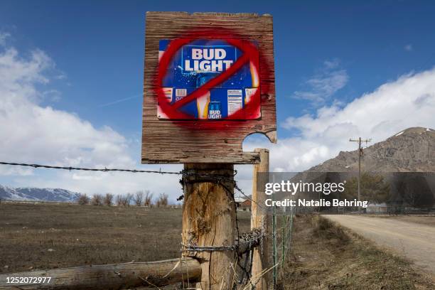 Sign disparaging Bud Light beer is seen along a country road on April 21, 2023 in Arco, Idaho. Anheuser-Busch, the brewer of Bud Light has faced...