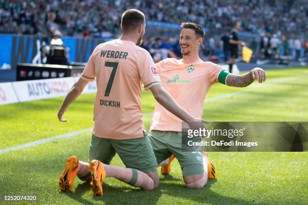 Marvin Ducksch of Werder Bremen celebrates his goal with Marco Friedl of Werder Bremen during the Bundesliga match between Hertha BSC and SV Werder...