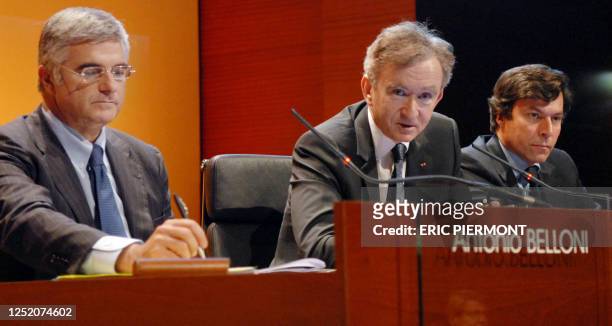 S chief executive Bernard Arnault , group managing director Antonio Belloni and Financial director Jean-Jacques Guiony give a press conference...