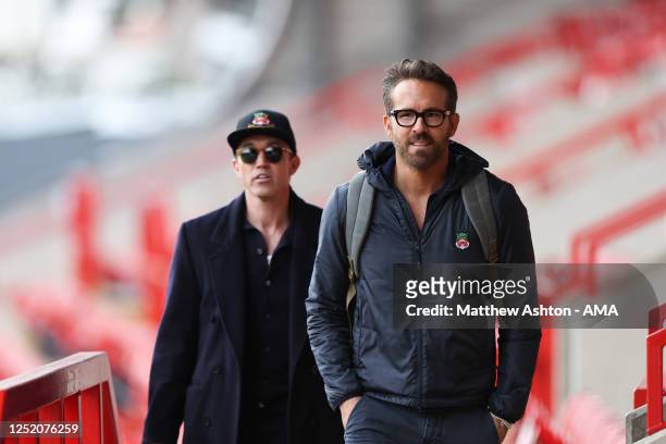 Wrexham Football Club owners Rob McElhenney and Ryan Reynolds arrive ahead of the Vanarama National League match between Wrexham and Boreham Wood at...