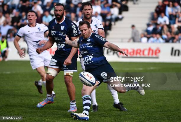 Bayonne's French fly-half Camille Lopez kicks the ball during the French Top14 rugby union match between Aviron Bayonnais and Montpellier Herault...