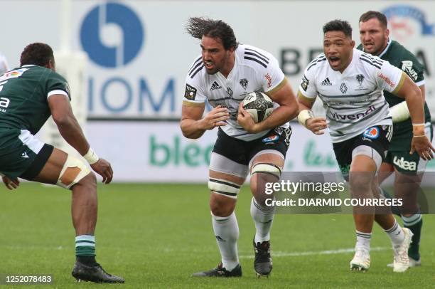 Brive's lock Lucas Paulos runs with the ball during the French Top14 rugby union match between Club Athletique Brive Correze Limousin and Section...