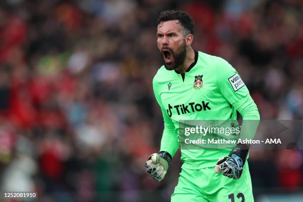 Ben Foster of Wrexham celebrates after his team score to make it 1-1 during the Vanarama National League match between Wrexham and Boreham Wood at...