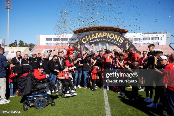 Hamrun Spartans FC club president Joseph Portelli lifts aloft the Malta BOV Premier League trophy after the BOV Premier League soccer match against...