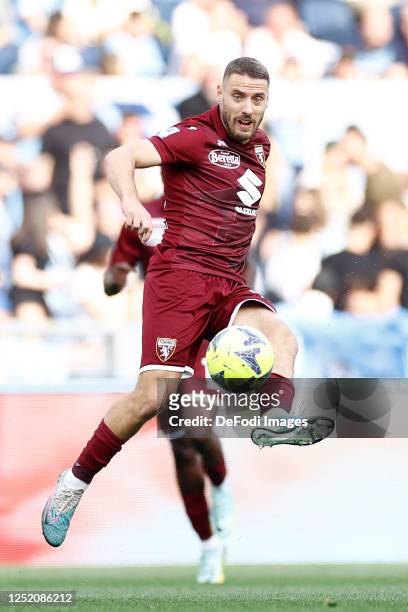 Nikola Vlasic of Torino FC controls the ball during the Serie A match between SS Lazio and Torino FC at Stadio Olimpico on April 22, 2023 in Rome,...