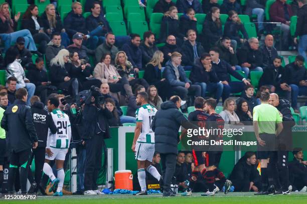 Referee Richard Martens stops the match during the Dutch Eredivisie match between FC Groningen and NEC Nijmegen at Euroborg on April 22, 2023 in...