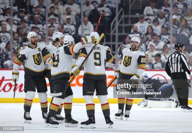 Jack Eichel of the Vegas Golden Knights celebrates his goal with teammates during action against the Winnipeg Jets in the second period of Game Three...