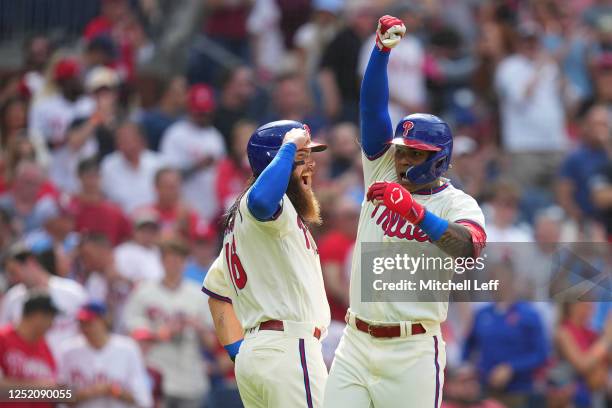 Cristian Pache of the Philadelphia Phillies celebrates with Brandon Marsh after hitting a two-run home run in the bottom of the third inning against...