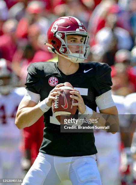 Ty Simpson of the Crimson Team looks to pass during the first half of the Alabama Spring Football Game at Bryant-Denny Stadium on April 22, 2023 in...