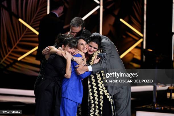 Chilian director Manuela Martelli celebrates on stage with '1976' movie's actors after being awarded at the Platino Awards for Ibero-American cinema...