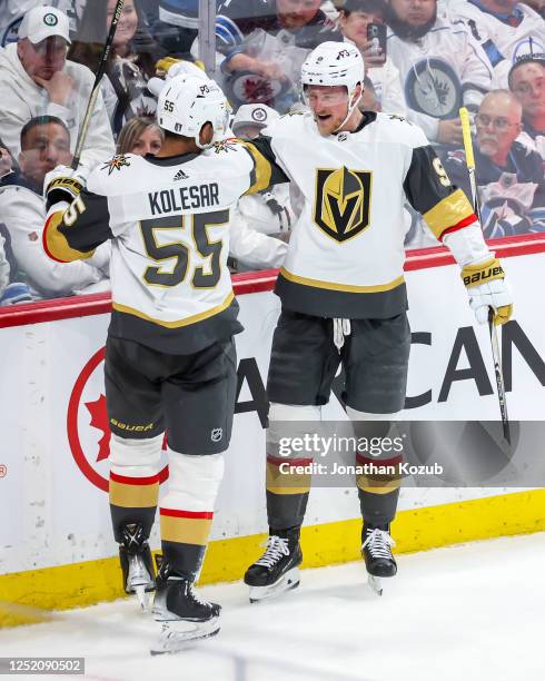 Keegan Kolesar and Jack Eichel of the Vegas Golden Knights celebrate a second period goal against the Winnipeg Jets in Game Three of the First Round...