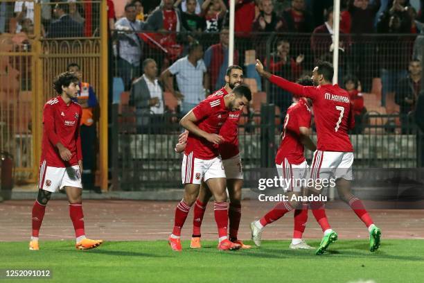 Players of Al-Ahly celebrate after scoring a gol during the CAF Champions League quarter final match between Egypt's al-Ahly and Morocco's Raja...