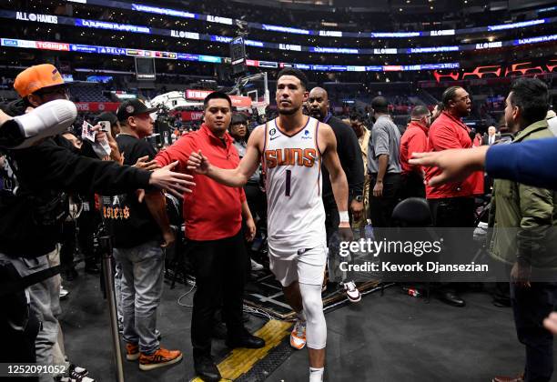 Devin Booker of the Phoenix Suns walks off the court after defeating the Los Angeles Clippers, 112-110, during Round 1 Game 4 of the 2023 NBA...