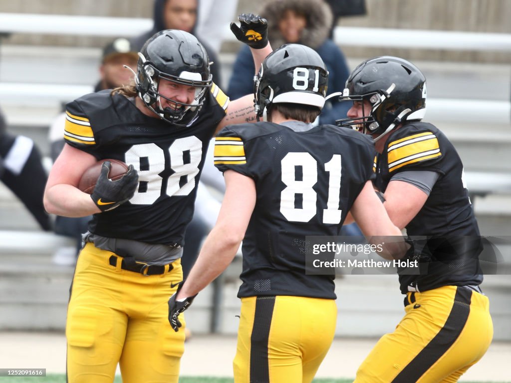 Iowa Springtime Tight end Hayden Large of the Iowa Hawkeyes celebrates with tight end ...