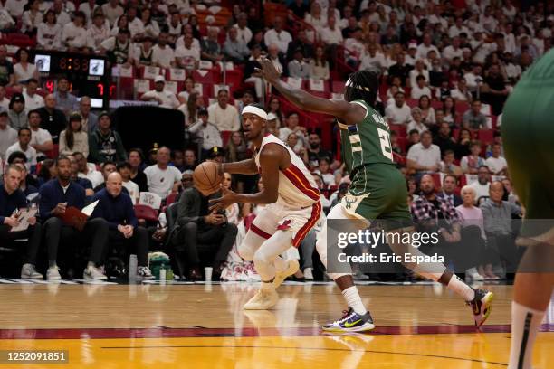 Jimmy Butler of the Miami Heat handles the ball during the game against the Milwaukee Bucks during Round One Game Three of the 2023 NBA Playoffs on...