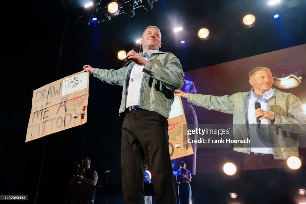 Macklemore Rapping American rapper Macklemore performs live on stage during a concert at ...