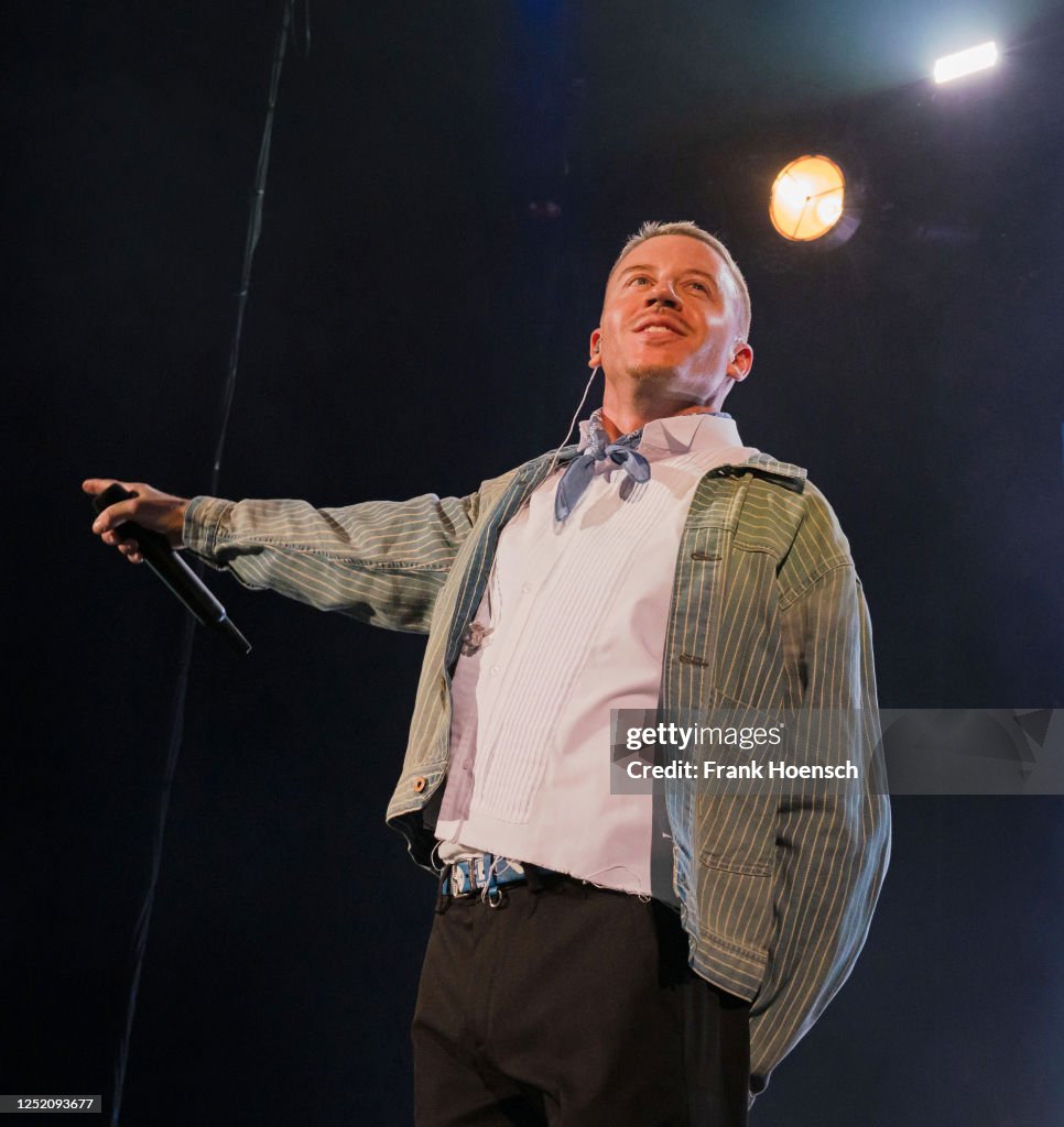 Macklemore Rapping American rapper Macklemore performs live on stage during a concert at ...