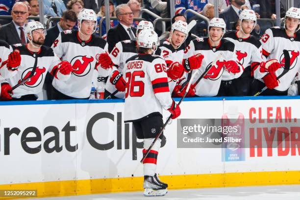 Jack Hughes of the New Jersey Devils celebrates after scoring a goal in the second period against the New York Rangers in Game Three of the First...