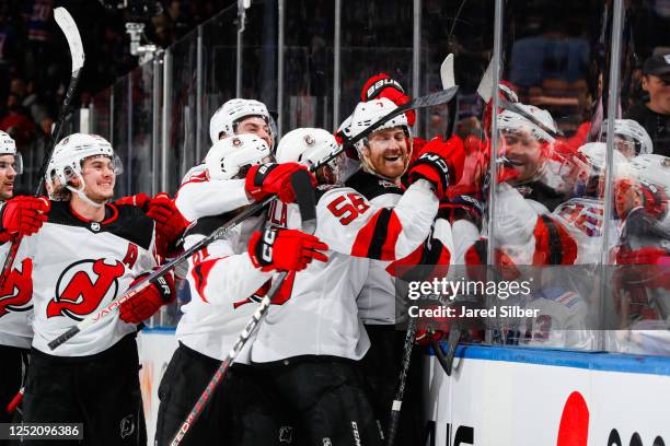 Dougie Hamilton of the New Jersey Devils celebrates after scoring the game winning goal in overtime against the New York Rangers in Game Three of the...